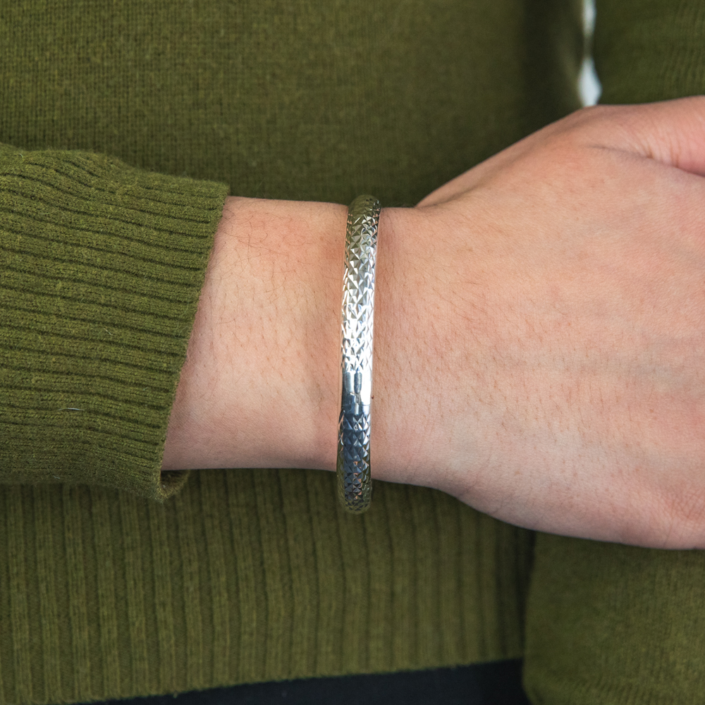 Sterling Silver Textured 7mm Hinged With Saftey Chain Bangle